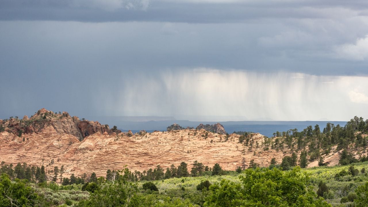 Rain Falls On The Rock Outcroppings In Zion National Park
