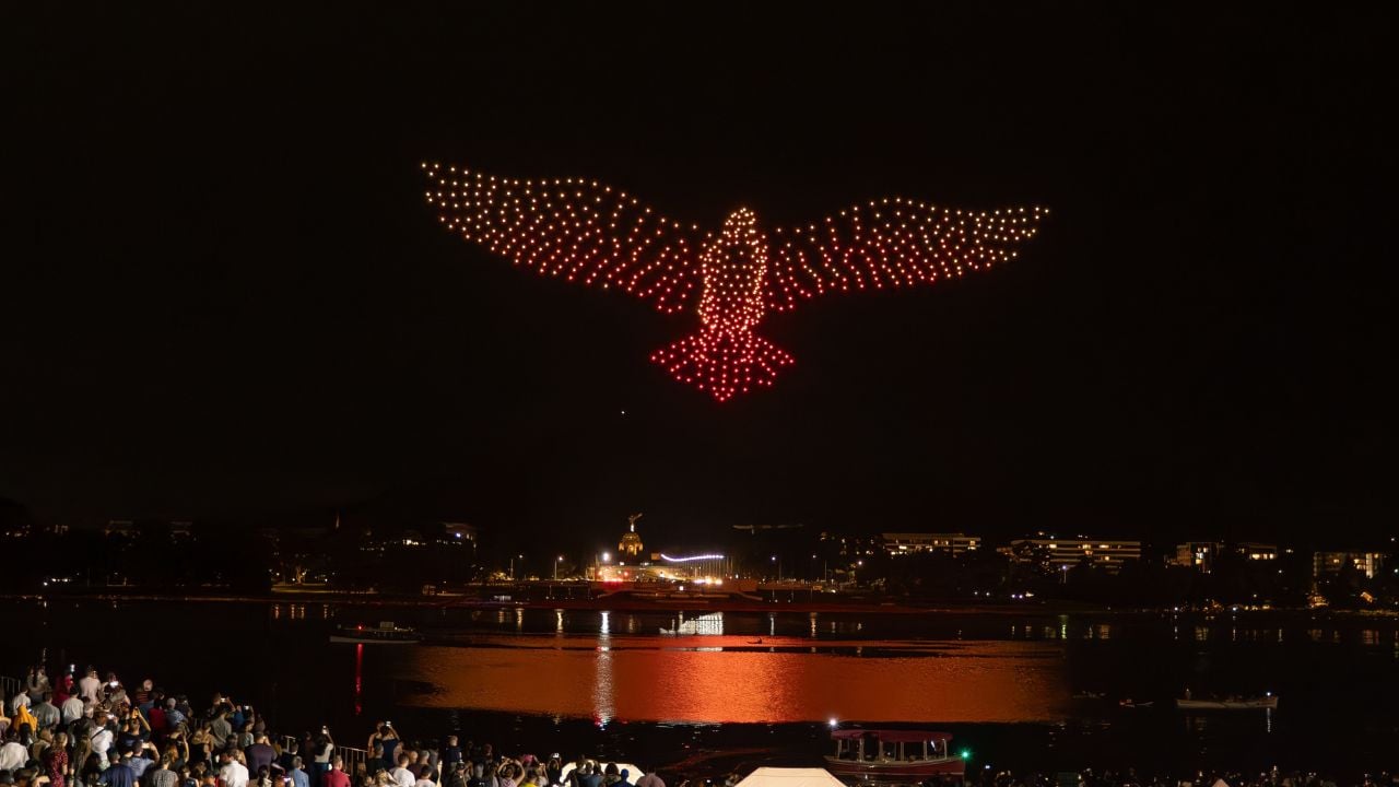 Canberra, Australia-"FLIGHT: Drone SkyShow and Night Markets" 600 drones soaring over Lake Burley Griffin, presenting a trilogy of stories 1) Welcome, Yumalundi 2) Rejoice 3) One and Many