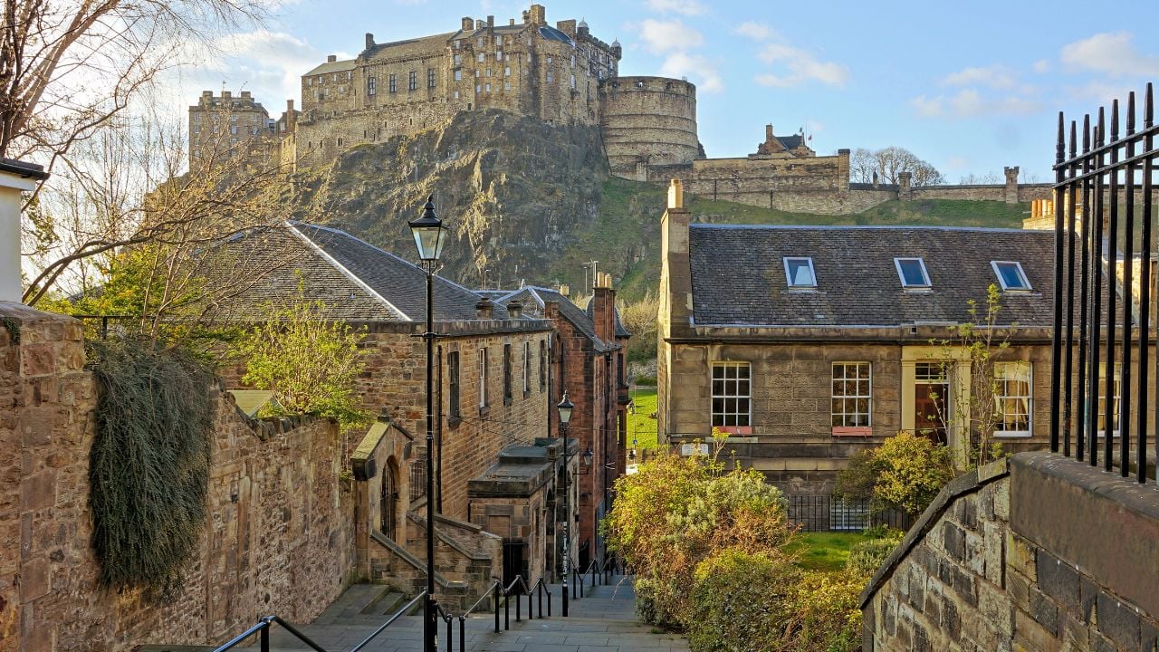 View of Edinburgh castle from the medieval streets of the old town, Scotland