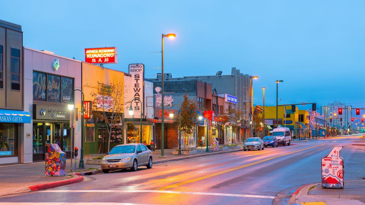 ANCHORAGE, ALASKA, USA - SEP. 21, 2019: Historic buildings at night on 4th Avenue at F Street in downtown Anchorage, Alaska, AK, USA.