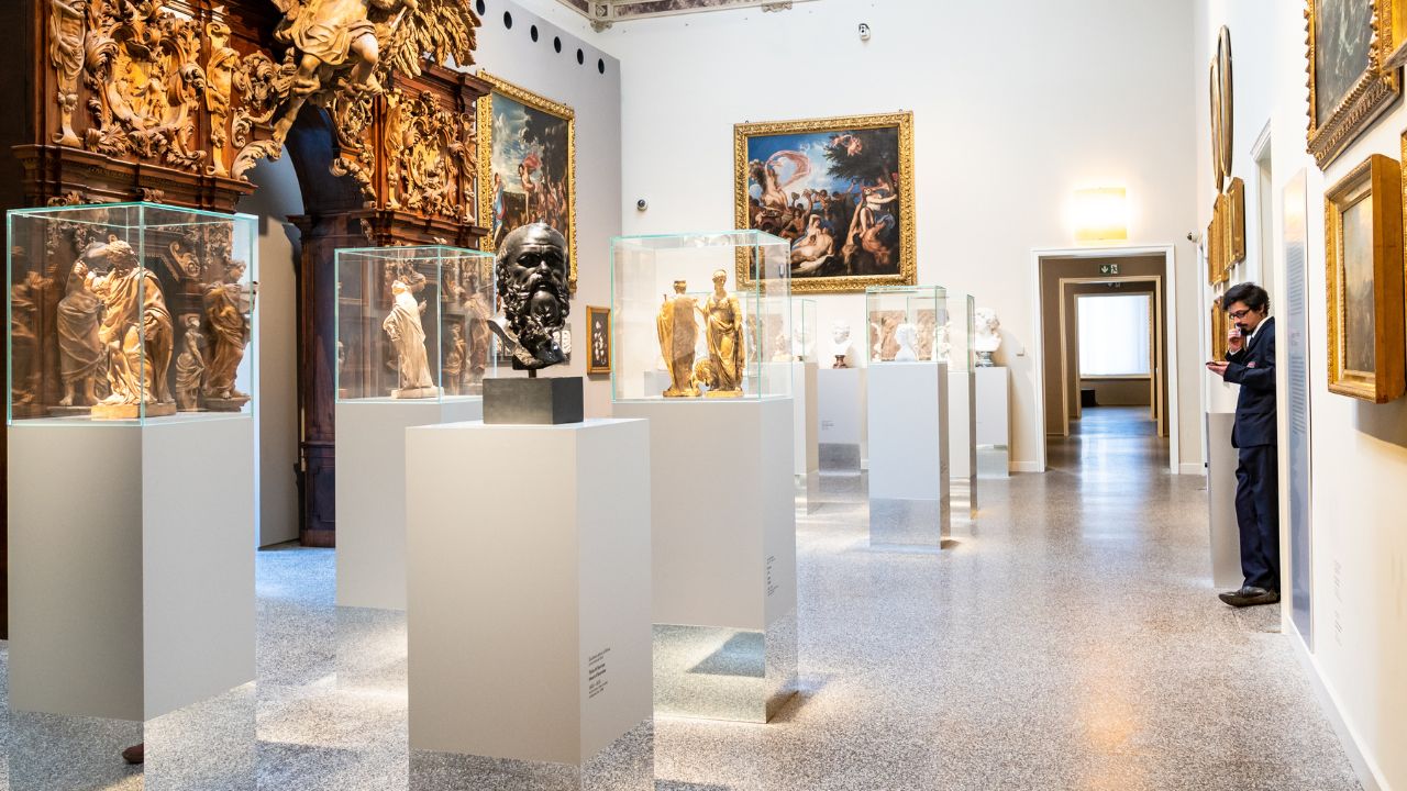 BERGAMO, ITALY - FEBRUARY 20, 2019: attendant in hall of Accademia Carrara di Belle Arti di Bergamo (Art Gallery and Academy of Fine Arts) in Bergamo city, Lombardy