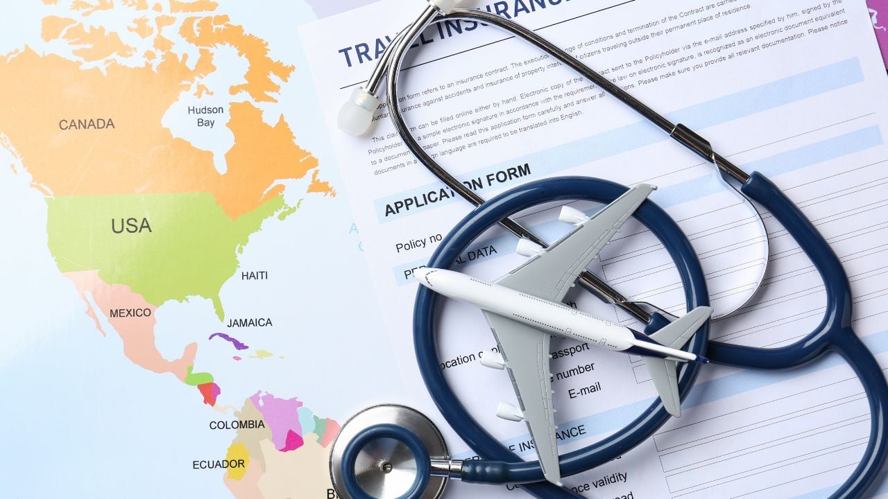 Medical tourism. Travel insurance application form, stethoscope and airplane model on world map, top view