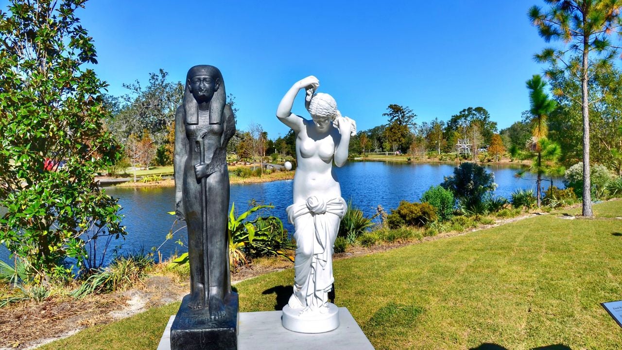 New Orleans, LA, US- November 23, 2022: The Mete of the Muse, by Fred Wilson, in The Sydney and Walda Besthoff Sculpture Garden. African and European sculptures highlights bias in the world of art
