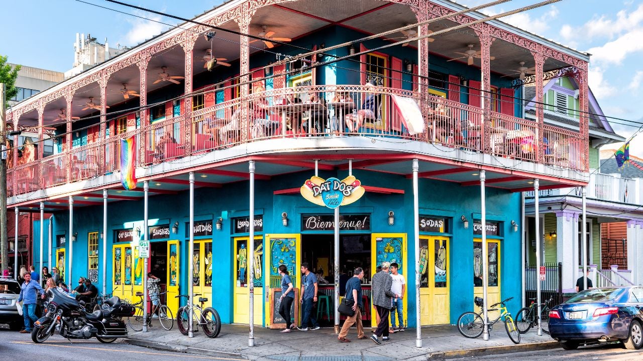 New Orleans, USA - April 22, 2018: Dat Dog restaurant bar on Frenchmen Street in French Quarter of Lousiana city serving hot dogs, beer and sausages