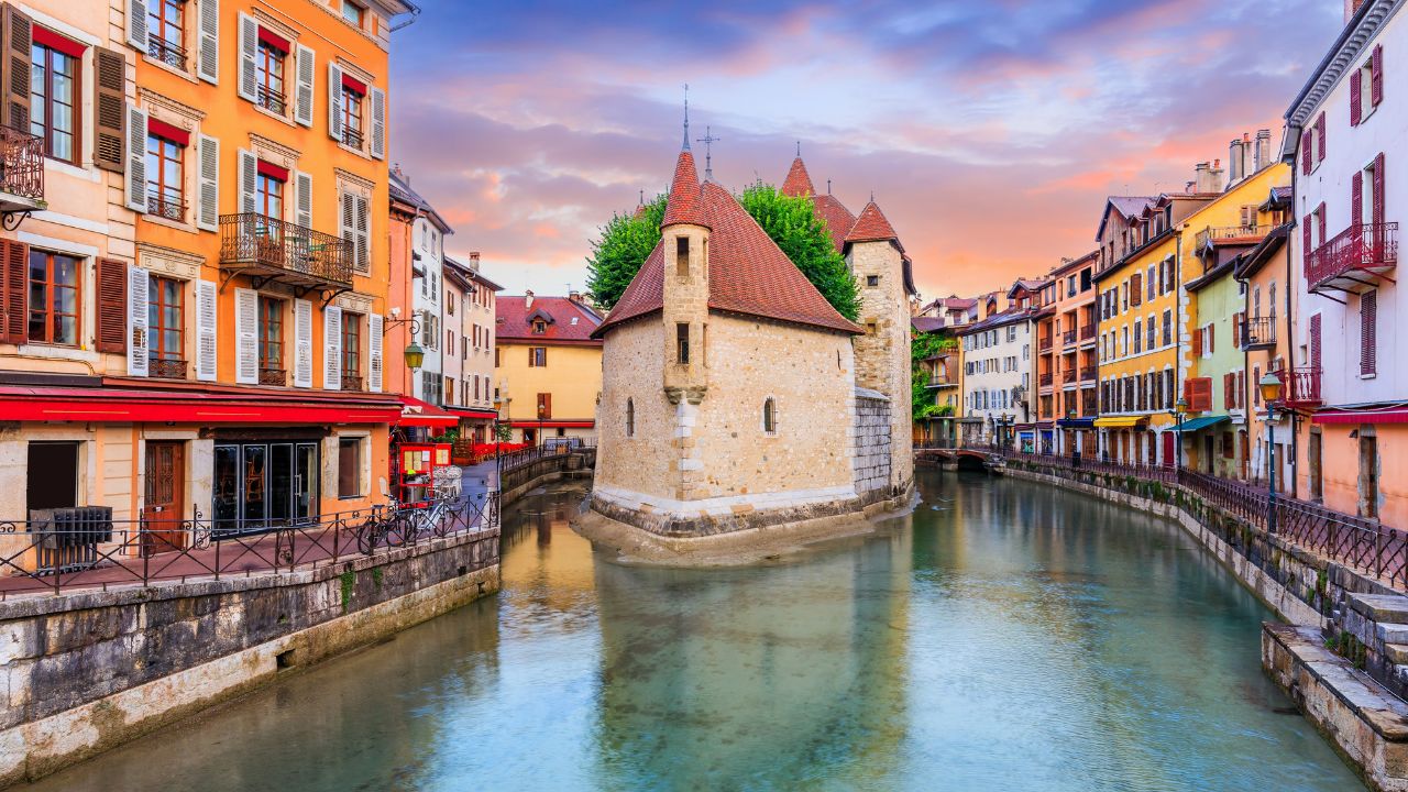 Annecy, Haute Savoie, France. The castle on an island (Palais de l'Isle) and Thiou river.