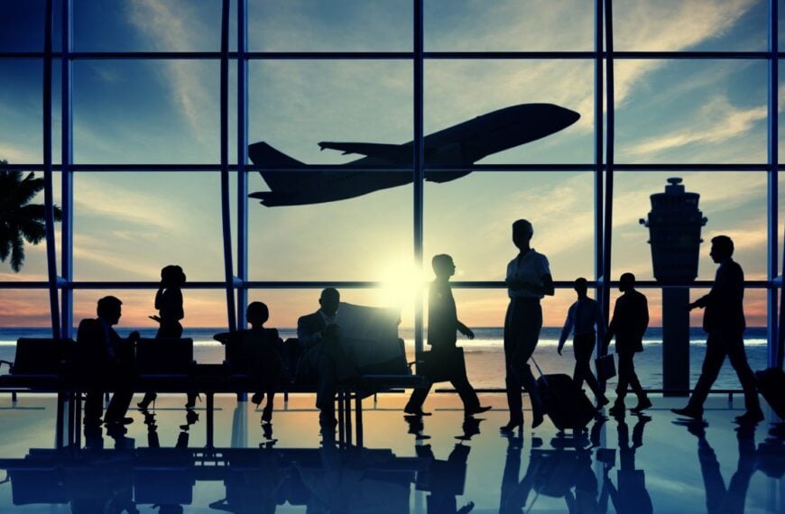 Back Lit Business People Traveling Airplane Airport Concept