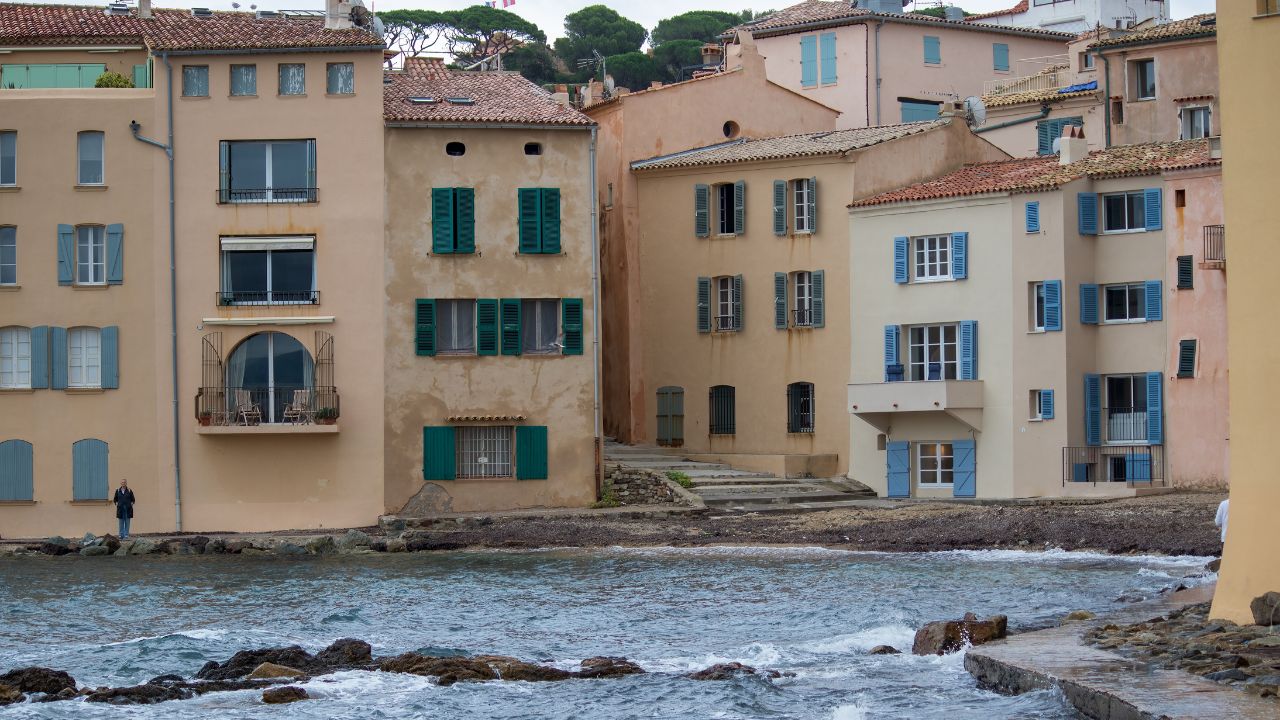 SAINT TROPEZ, FRANCE – OKTOBER 2nd, 2012. The old fishing port of Saint Tropez is the old center. The old fishermen's houses with the characteristic blue shutters are located around the harbor. The wa