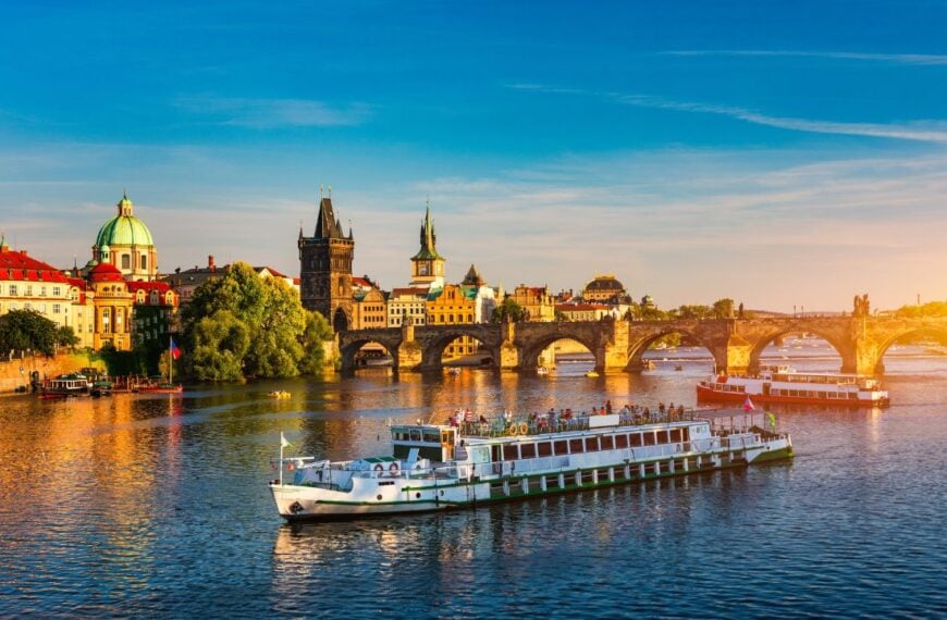 Charles Bridge in Prague in Czechia. Prague, Czech Republic. Charles Bridge (Karluv Most) and Old Town Tower. Vltava River and Charles Bridge. Concept of world travel, sightseeing and tourism.