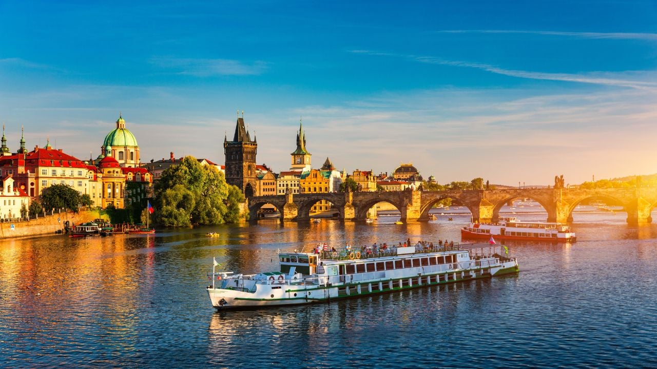 Charles Bridge, Old Town Tower, and the Vltava River in Prague, Czech Republic