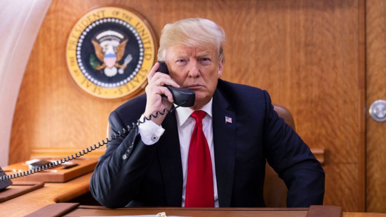 President Donald J. Trump is seen on the phone aboard Air Force One Wednesday, Oct. 10, 2018, as he talks with Alabama Governor Kay Ivey about the latest impact update on Hurricane Michael.