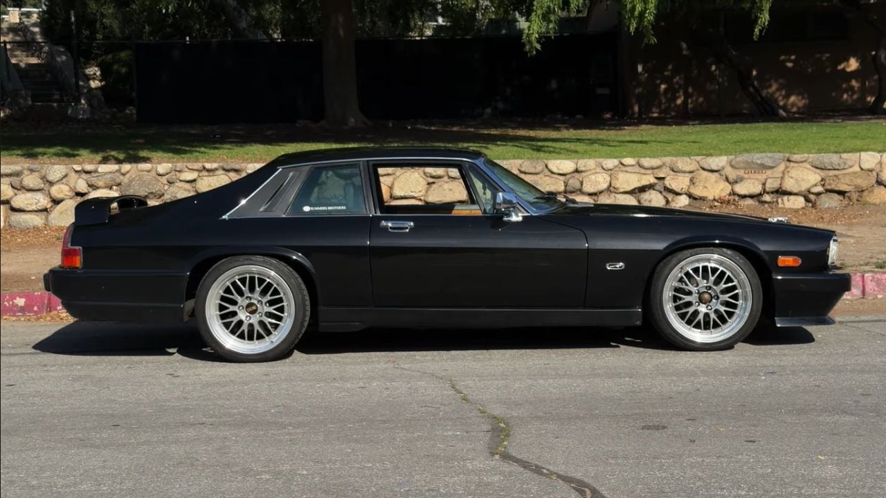 Side view of a 2JZ-swapped 1990 Jaguar XJS featured on Magnacars YouTube Channel