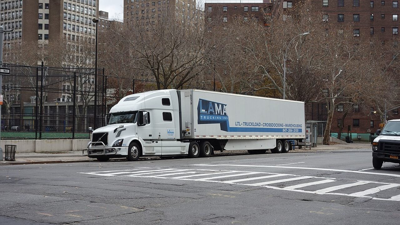A Volvo 18-wheeler truck park in front of Chelsea Park, at the southeast corner of 28th Street and 10th Avenue in Chelsea, Manhattan.