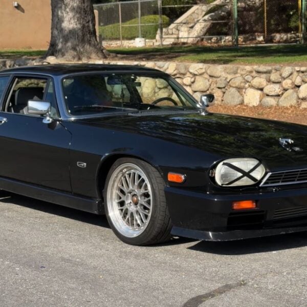 Front 3/4 view of a 2JZ-swapped 1990 Jaguar XJS featured on Magnacars YouTube Channel
