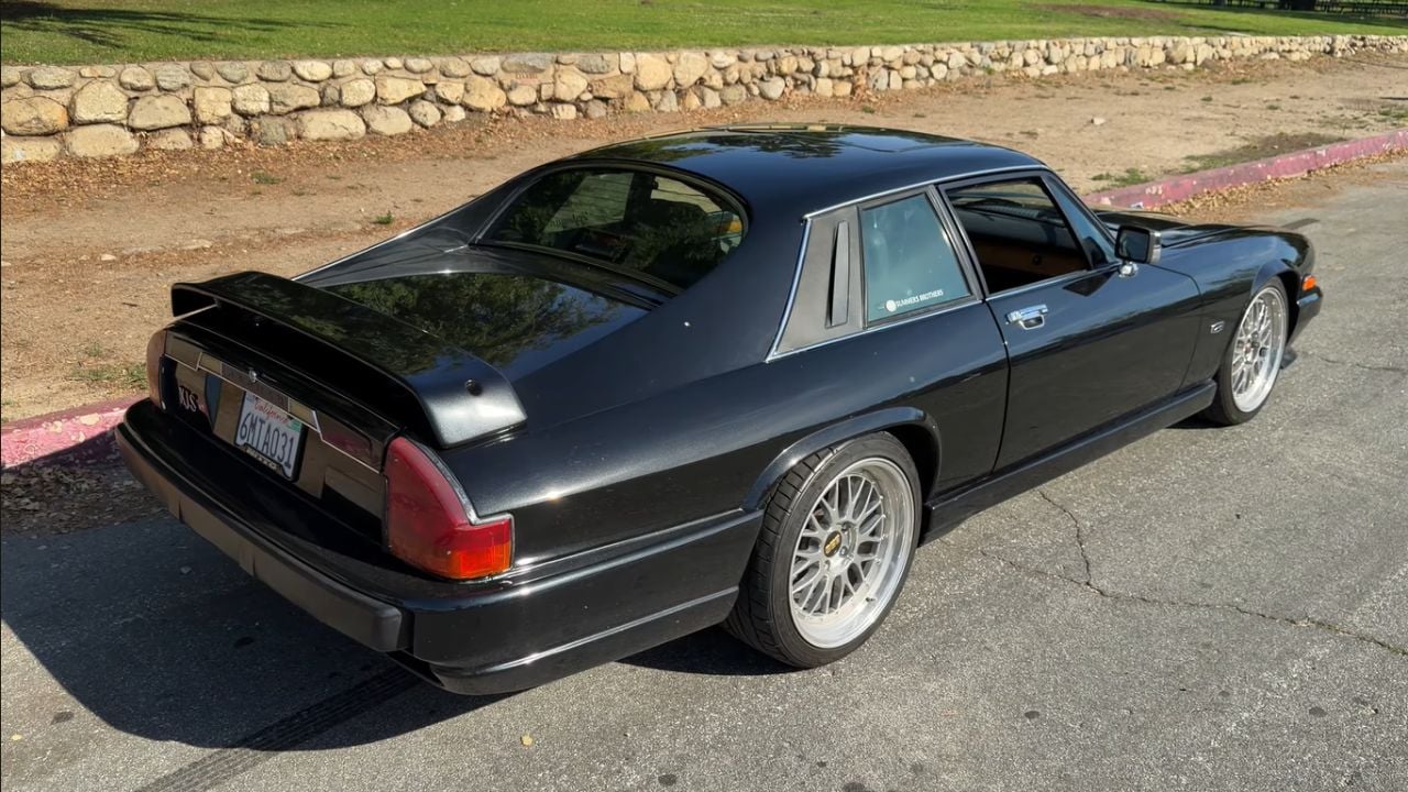 Rear 3/4 view of a 2JZ-swapped 1990 Jaguar XJS featured on Magnacars YouTube Channel