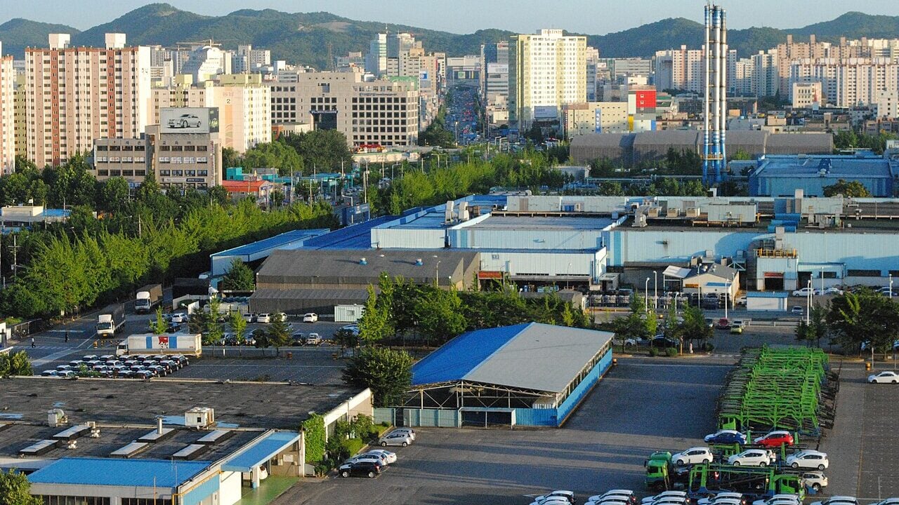 Bupyeong-gu, Incheon, Korea. GM Daewoo car factory is shown closely, the middle left is Bupyeong-gu office, and the far view of road end is Bupyeong matro station.