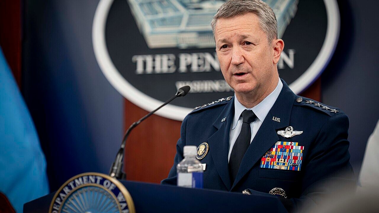 Chairman of the Joint Chiefs of Staff Gen. Dan Caine, alongside Secretary of War Pete Hegseth, holds a press briefing at the Pentagon in Arlington, Virginia, March 31, 2026.