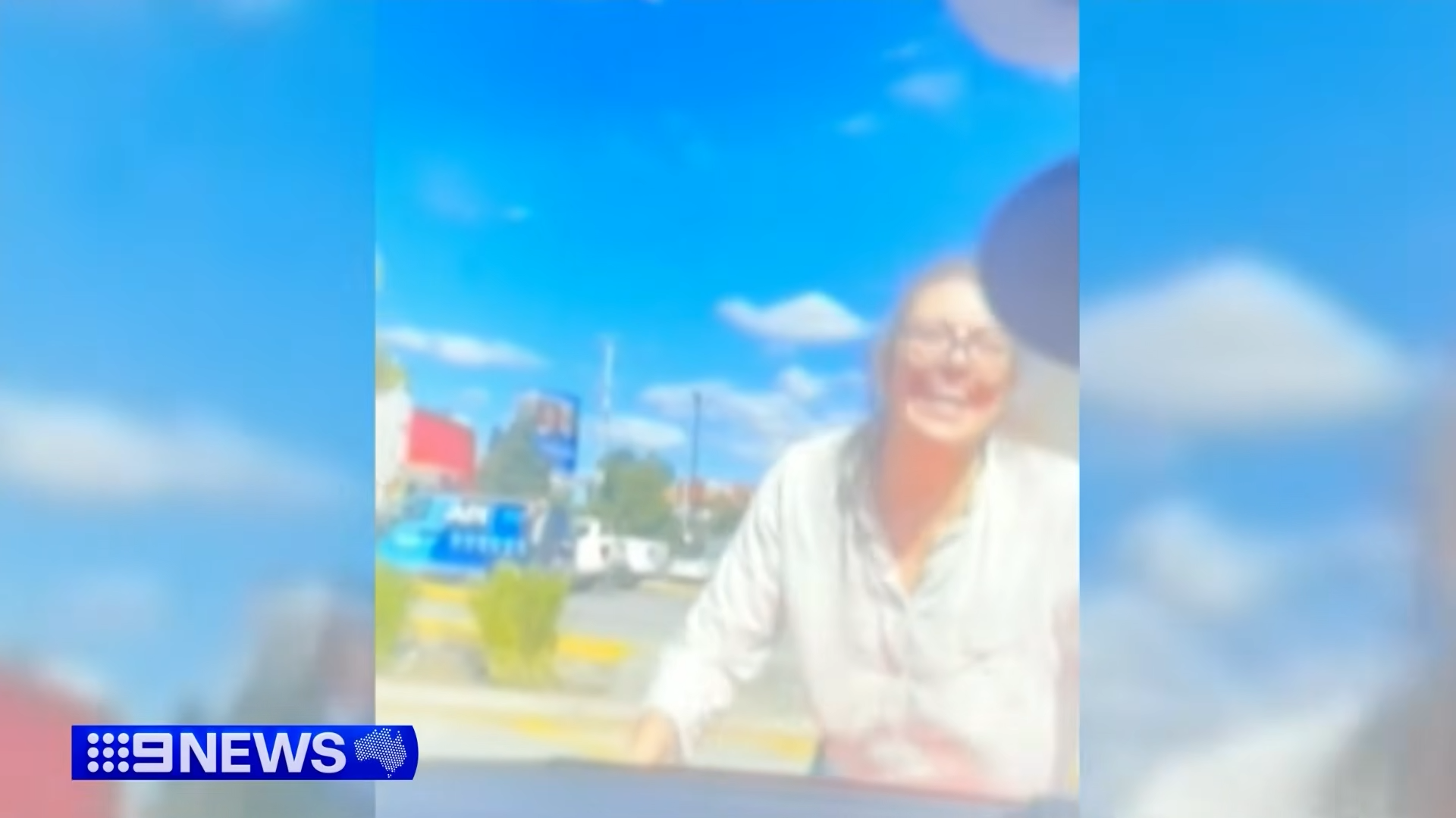 woman falls off car during road rage