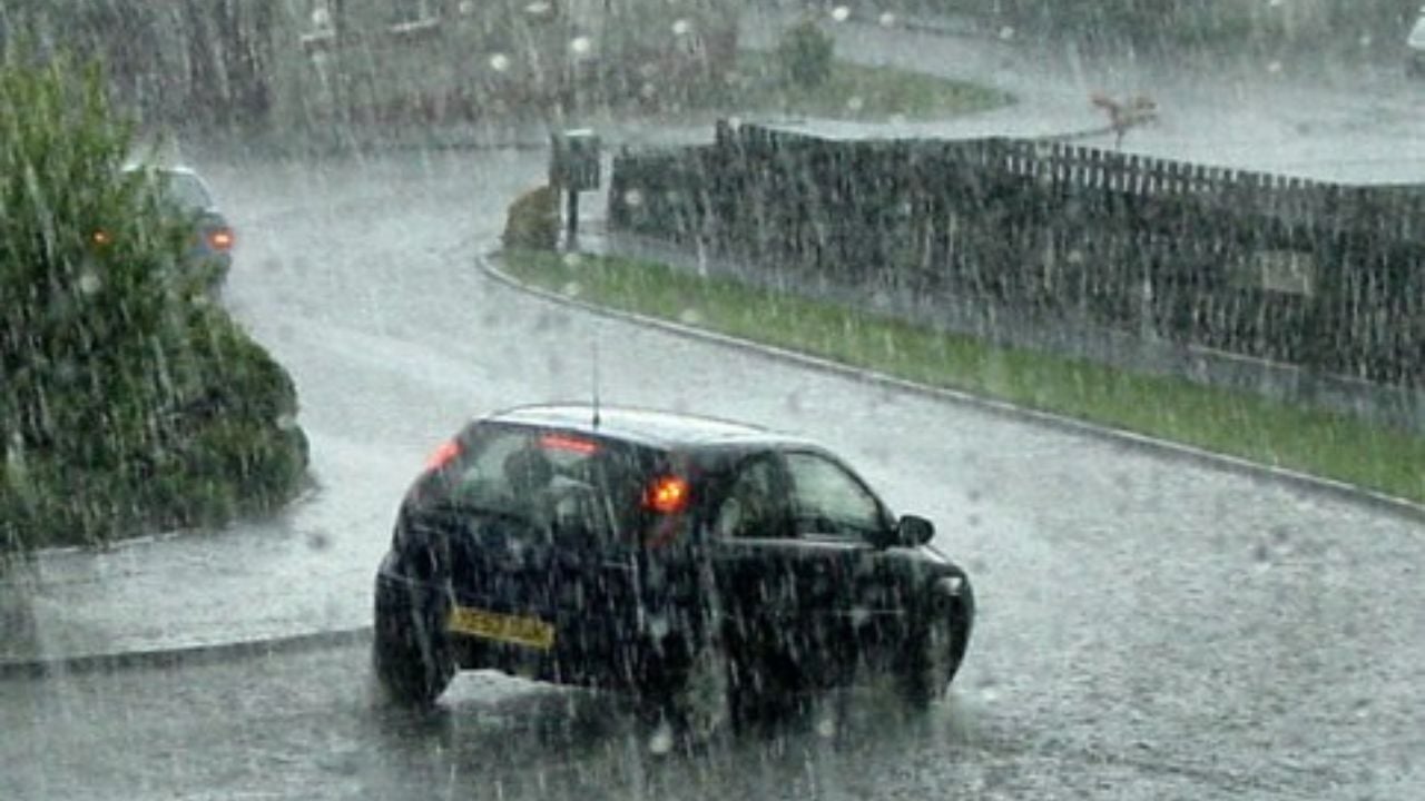 Torrential rain and hail in a thunderstorm at Barons Hill Avenue The storm caused flooding in places.