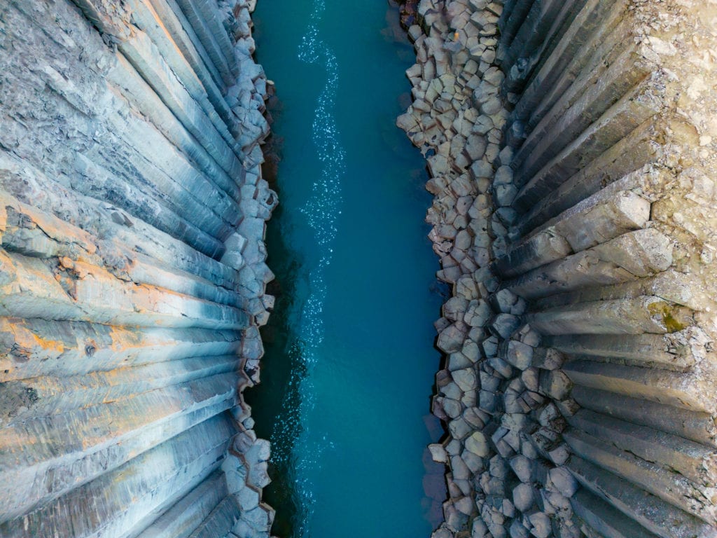The towering basalt columns of Studlagil Canyon. It's one of the must-see things to do in Iceland.