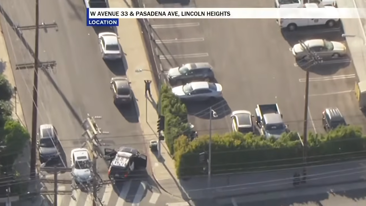 live police chase red car through los angeles