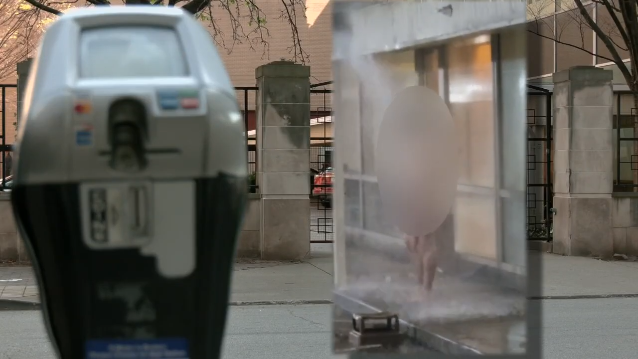 naked man showering outside