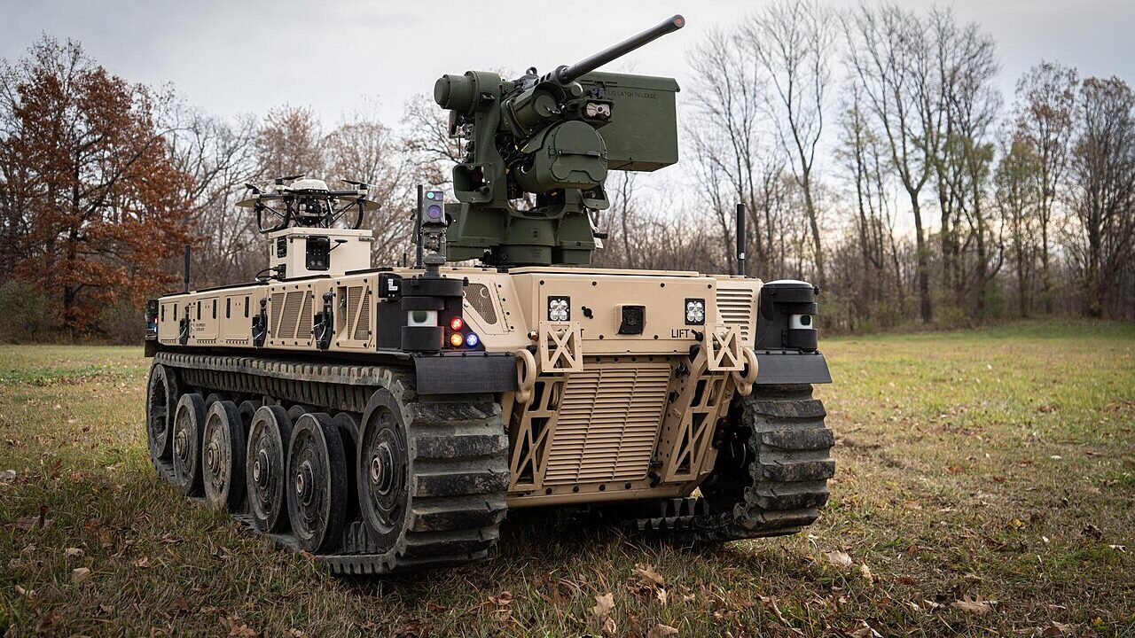 Expeditionary Modular Autonomous Vehicle (EMAV) is a high-mobility tracked unmanned ground vehicle (UGV) that can operate autonomously, integrate with various systems, and carry heavy payloads while maintaining a low profile for Marine use.
