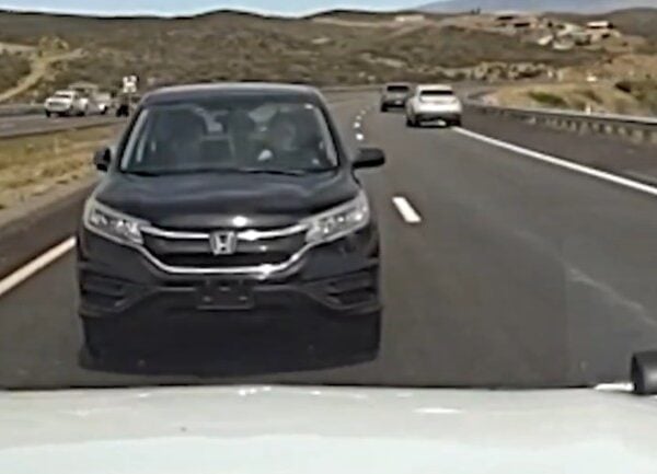 Bizarre Incident Shows Wrong-Way Driver Crash Head-On Into Arizona Police Patrol at Crawling Speed