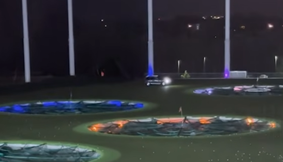 car driving on top golf course