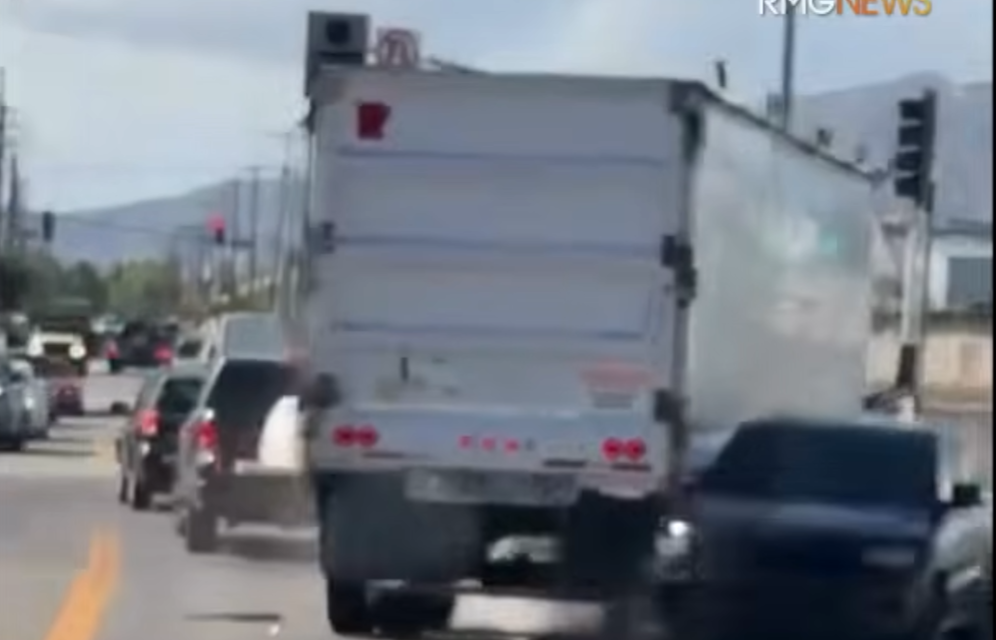 semi truck rams into black suv