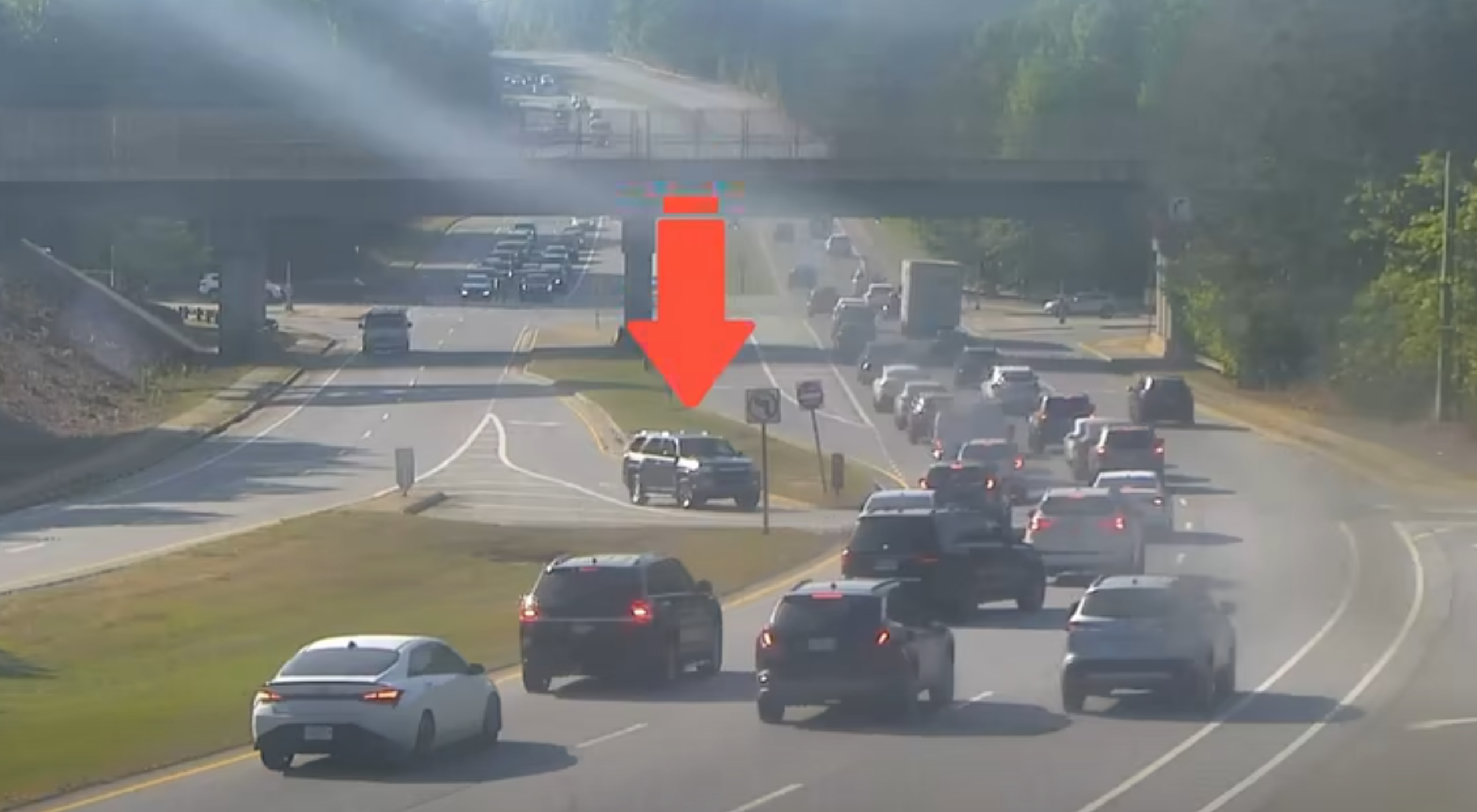 suv trying to merge onto highway flips