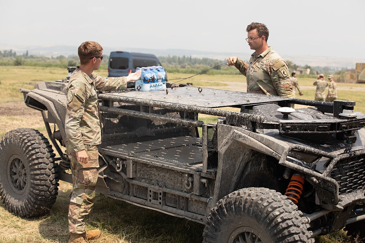 1 ⁄ 1 More details U.S. Army Soldiers with 1st Squadron, 91st Cavalry Regiment, 173rd Airborne Brigade, unload supplies off of an Overland AI ULTRA Fully Autonomous Tactical Vehicle during Agile Spirit 25 at the Combat Training Center, Vaziani Training Area, Georgia, July 29, 2025.