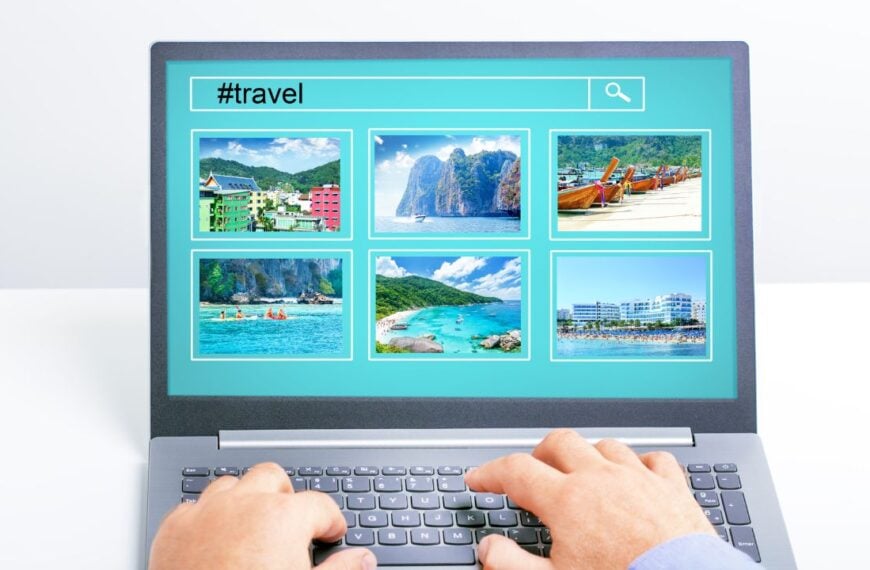 Man planning vacation trip and searching information or booking an hotel on a laptop.