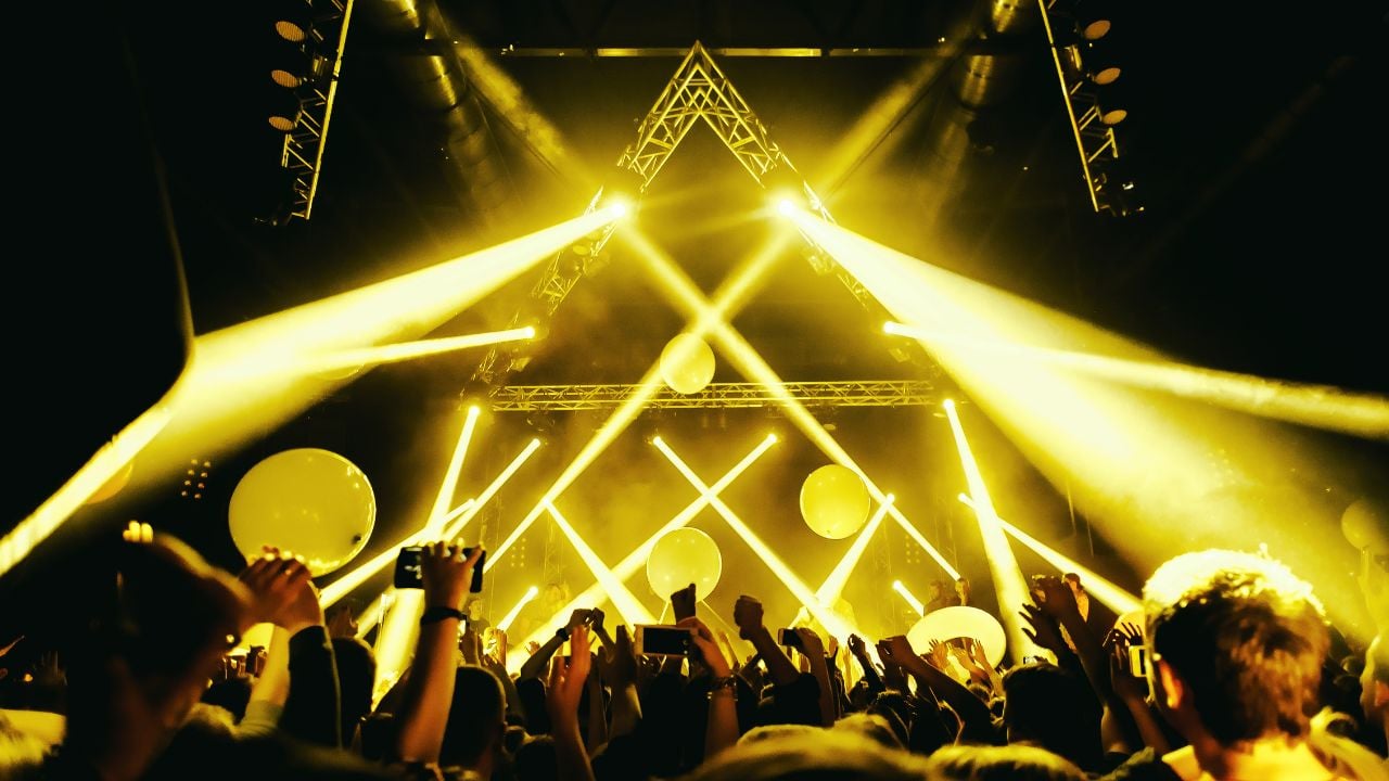 Crowd at a live concert with stage lights
