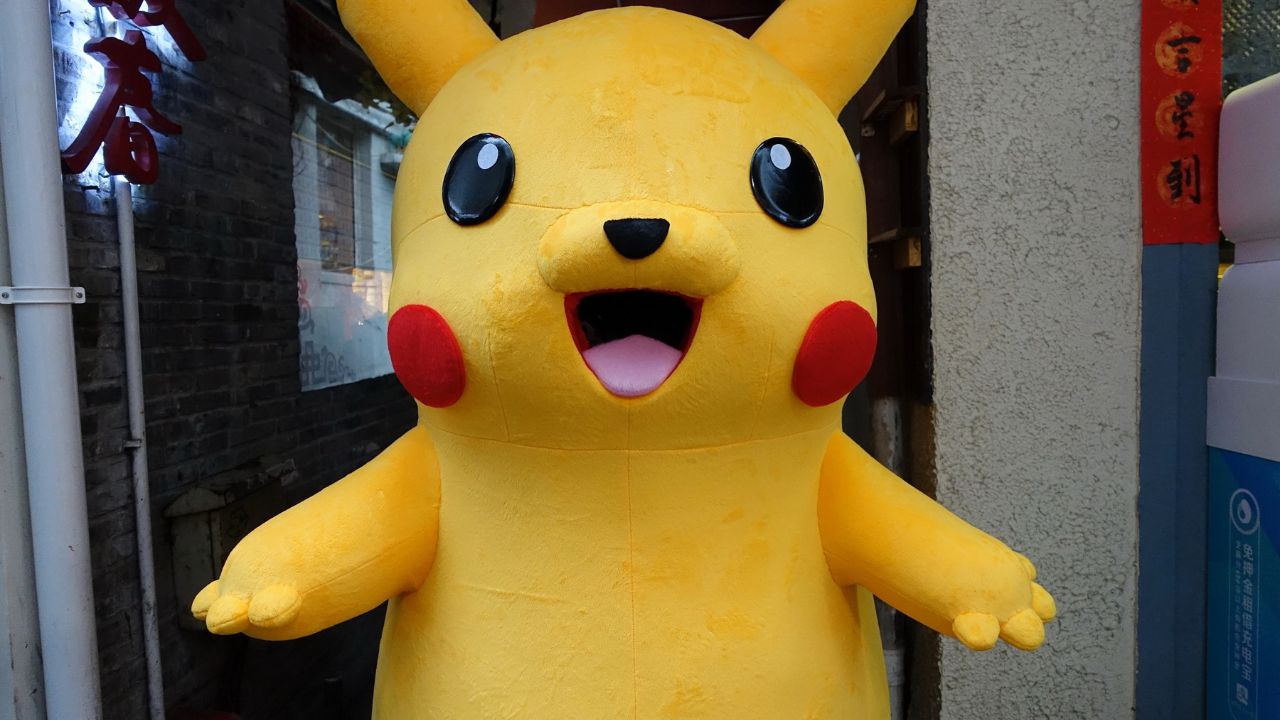 Pokémon figure display in a city setting