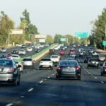 Los Angeles, USA - October 8: Freeway traffic with cars and signs in Los Angeles, Los Angeles, CA on October 8, 2017.