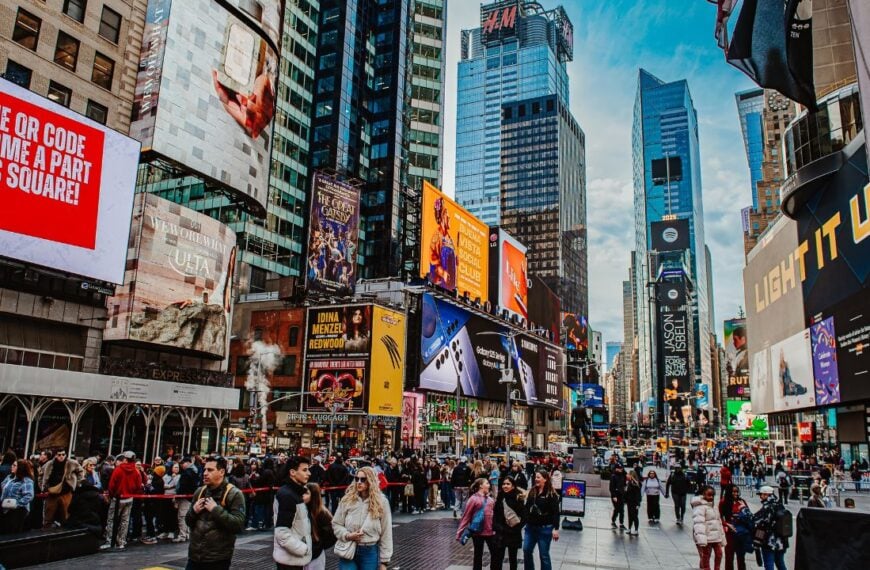 New York, USA, 28 May 2025: Crowds enjoying Times Square in New York. Visitors wander through Times Square, taking in the vibrant lights and atmosphere of this iconic location in New York.