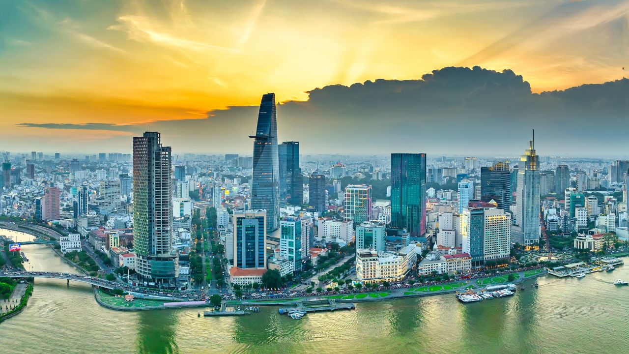 Ho Chi Minh city, Vietnam - August 7th, 2023: Aerial view from drone of a Ho Chi Minh city with development buildings, transportation, energy infrastructure. Financial and business centers in Vietnam.