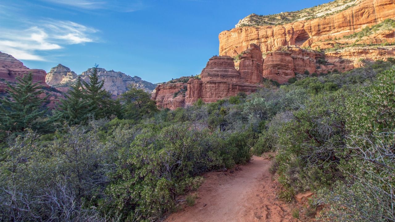 Sedona hiking trail at sunset leading to famous Boynton canyon.