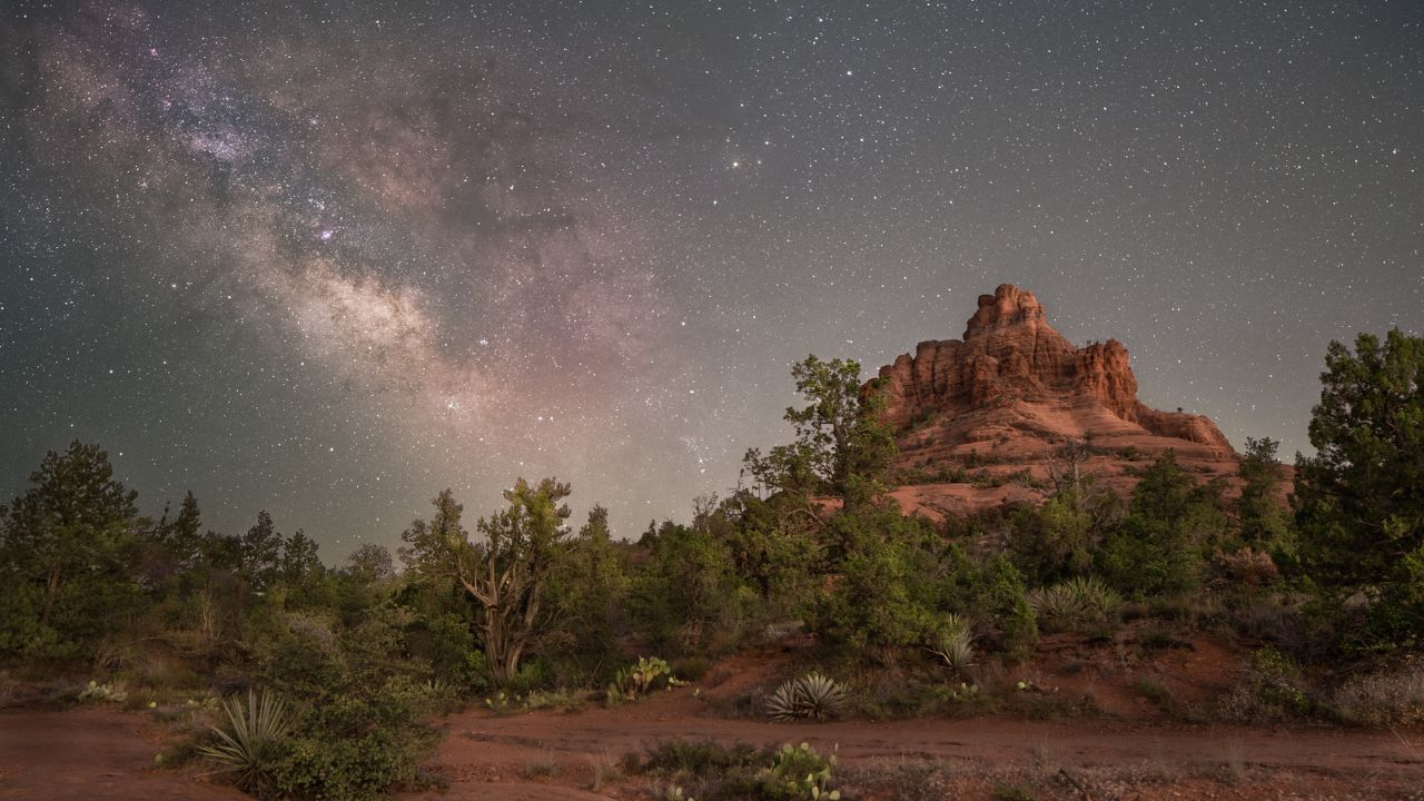 Stars and night sky of Milky Way Galaxy over rock formation in Sedona Arizona