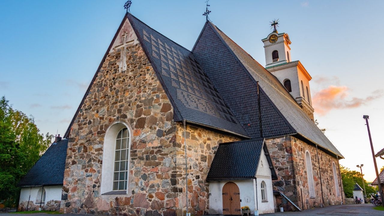 Sunset of Church of the Holy Cross in Finnish town Rauma.