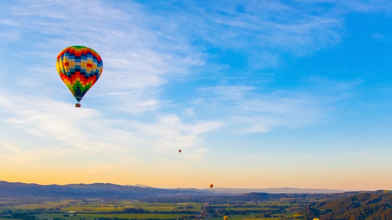 Hot-air balloon over Napa Valley vineyards at sunrise