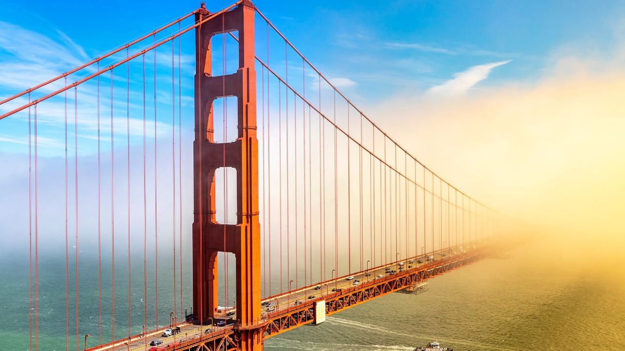 Golden Gate Bridge surrounded by Fog in San Francisco at sunset, California, USA