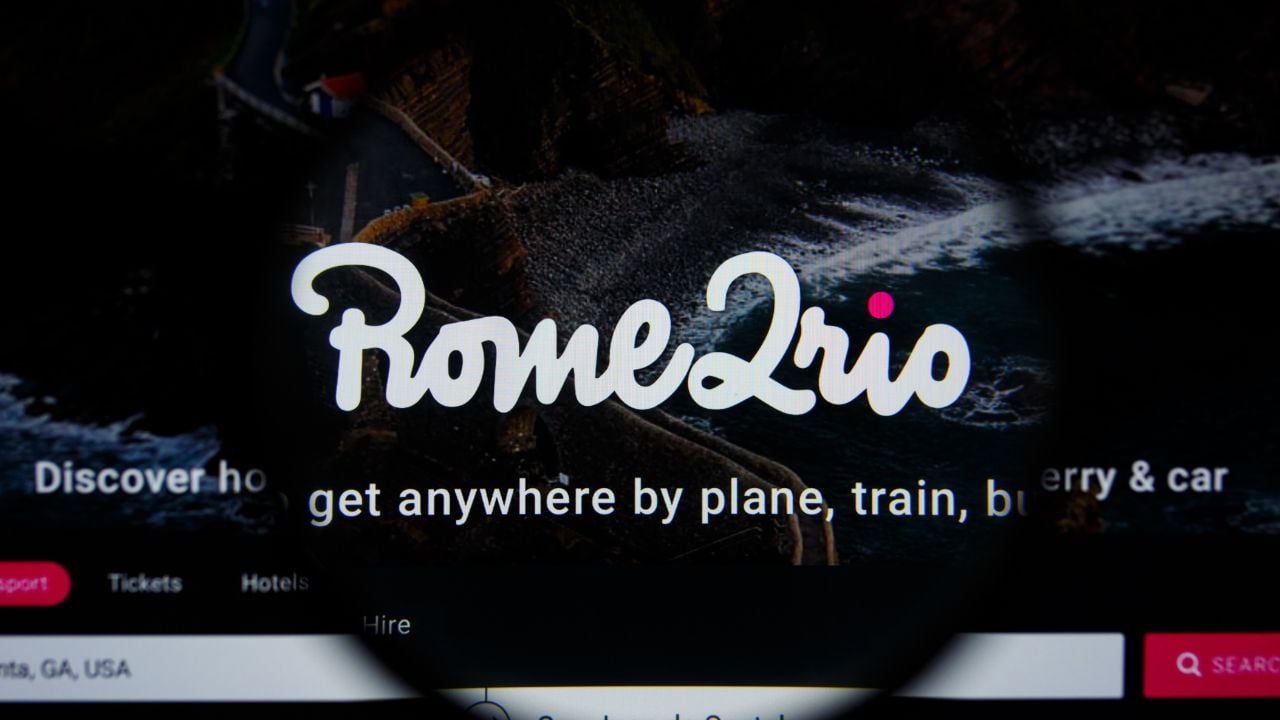 Rome2Rio website shown on a screen.