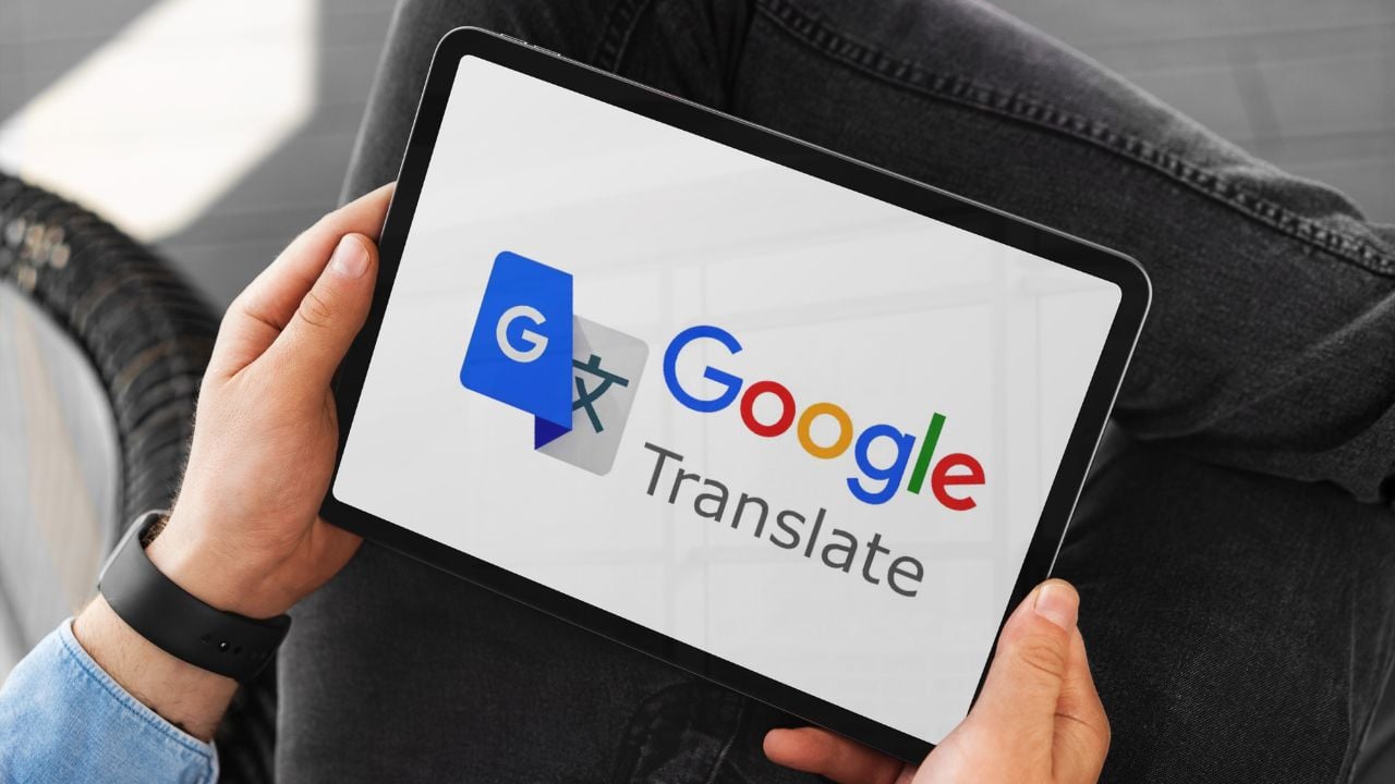 Man using Google Translate on a tablet.
