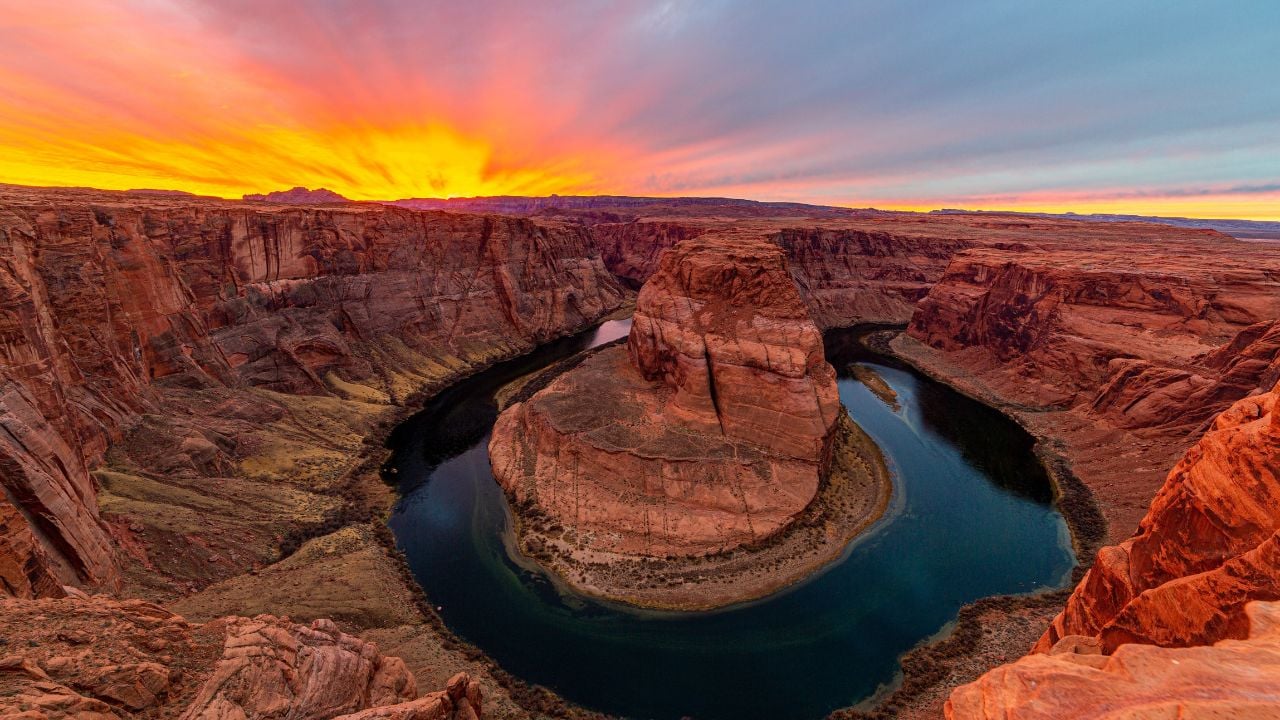 A vibrant sunset over Horseshoe bend, Grand Canyon, Arizona, United States