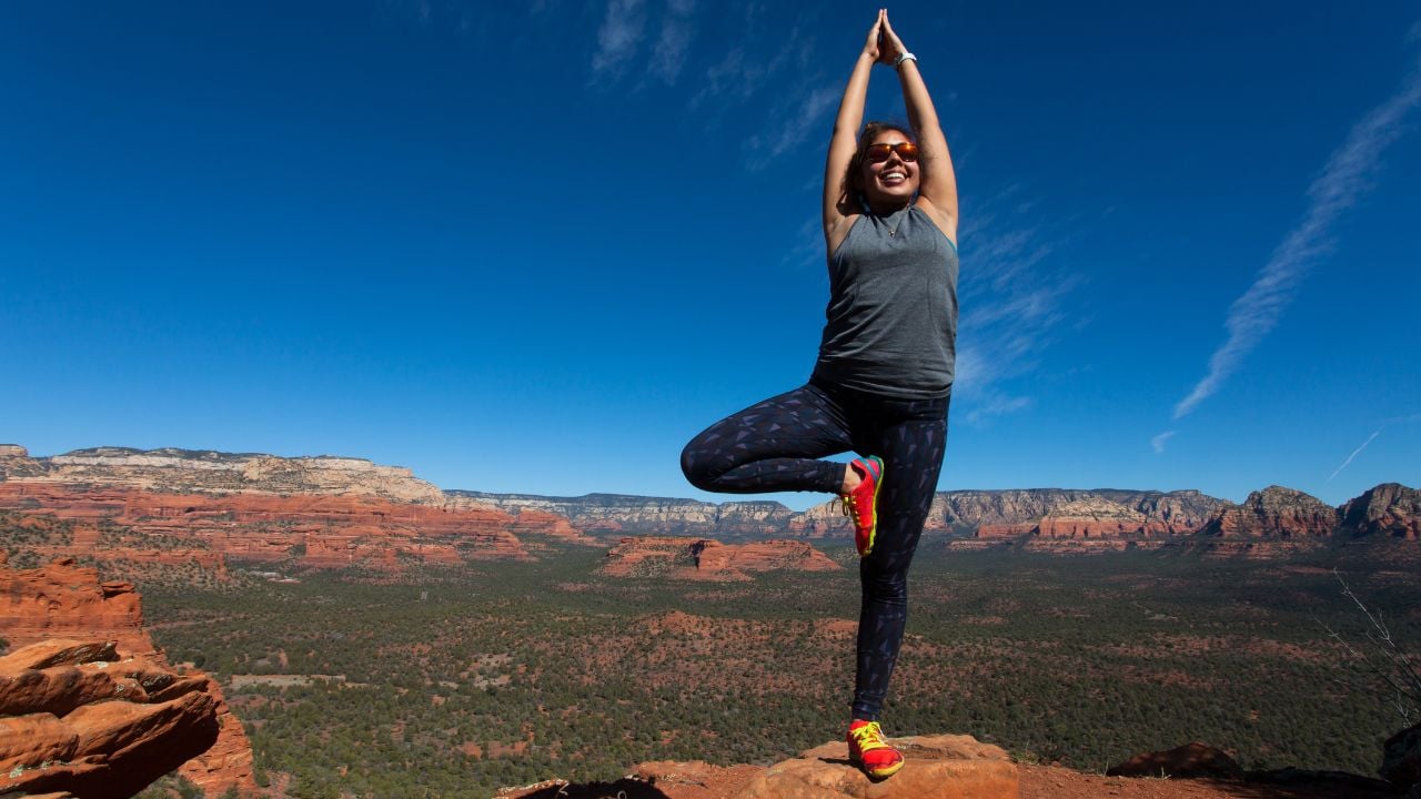 Young woman practicing yoga in peaceful Sedona, Arizona