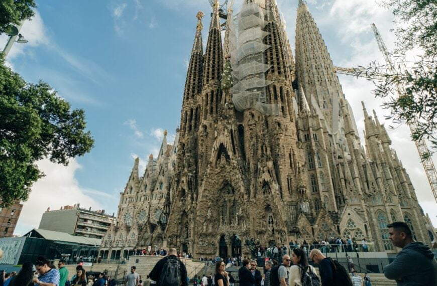 model sagrada de familia with tourists, spain - may 2 2024. High quality photo