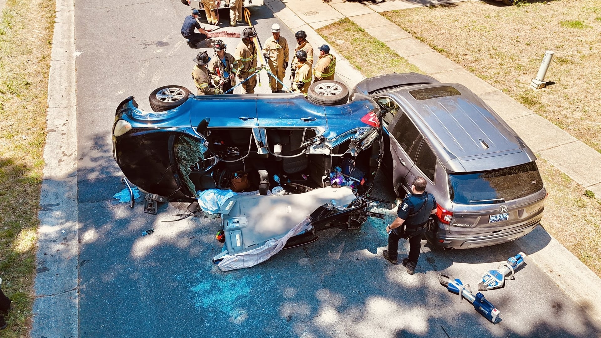 flipped over car crash rescue