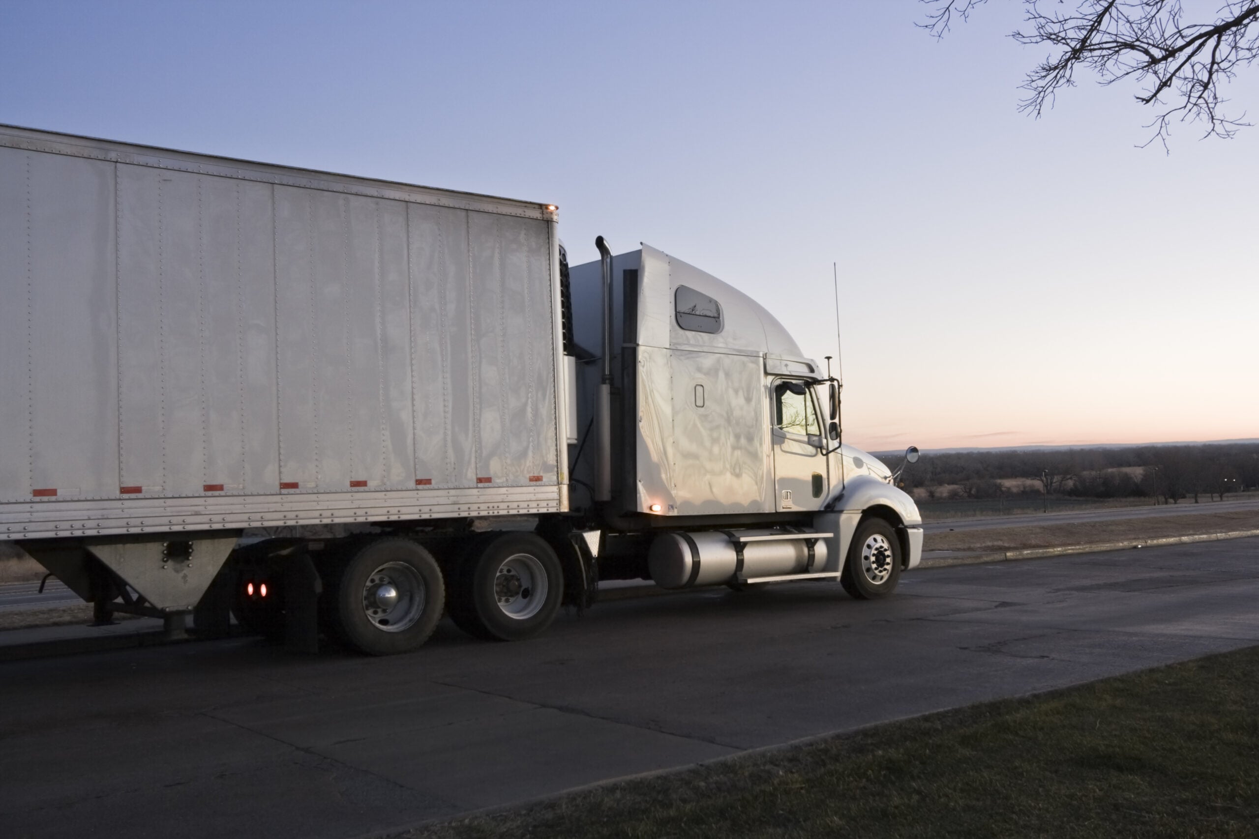 semi truck in sunrise