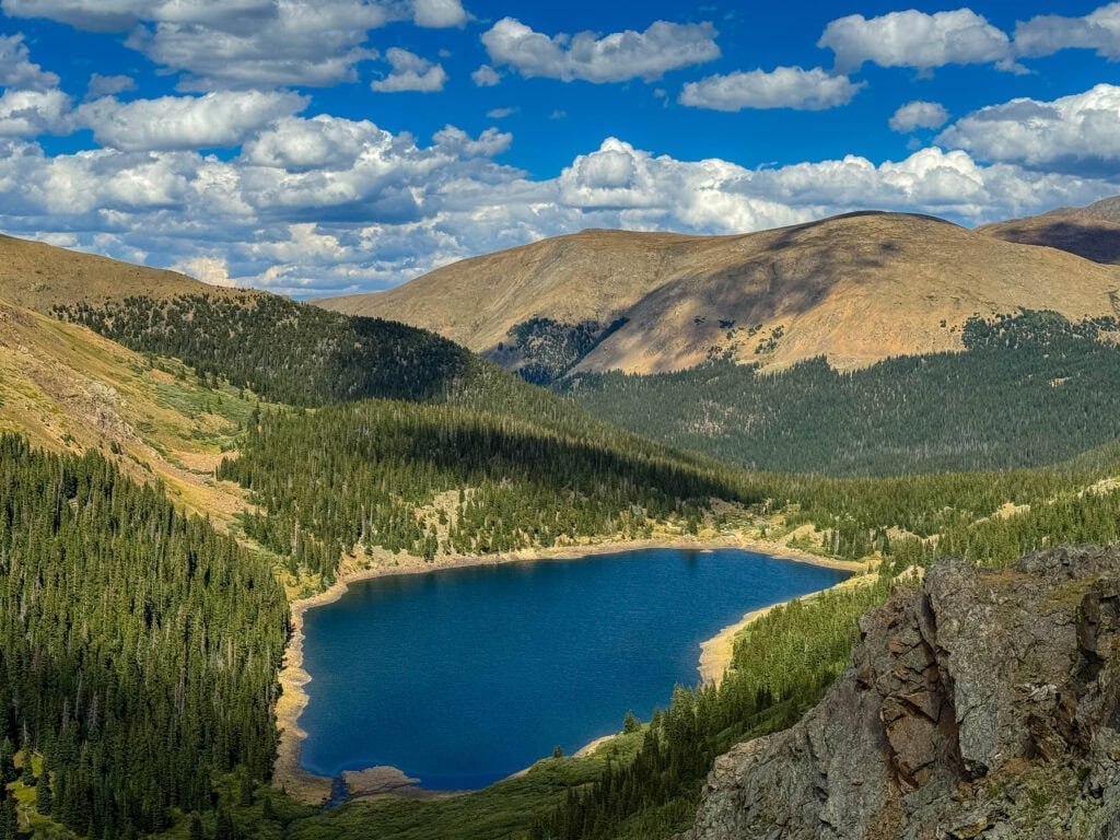 the view looking down on the private naylor lake from the silver dollar lake hike